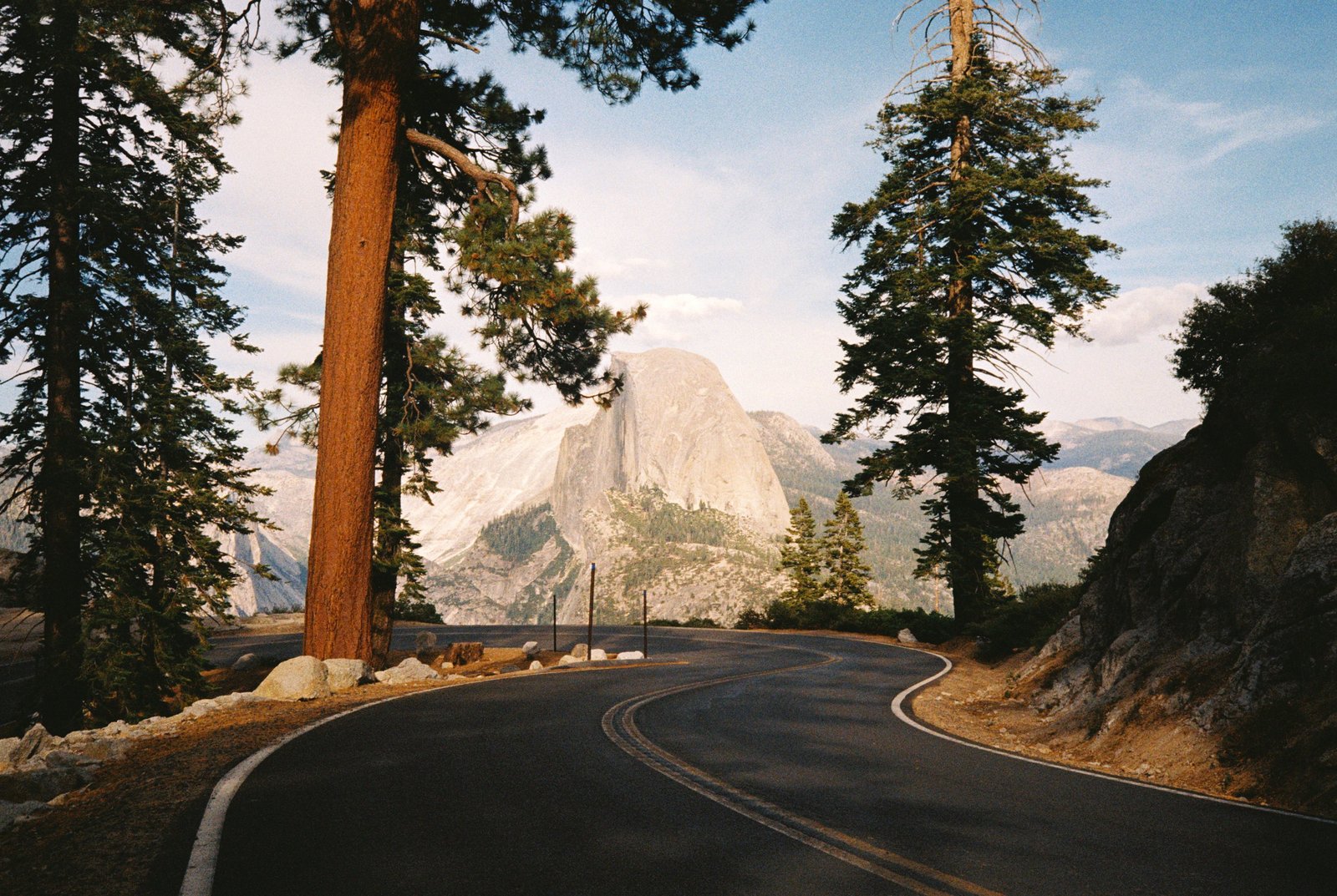 Winding road to Half Dome in Yosemite National Park through pine trees