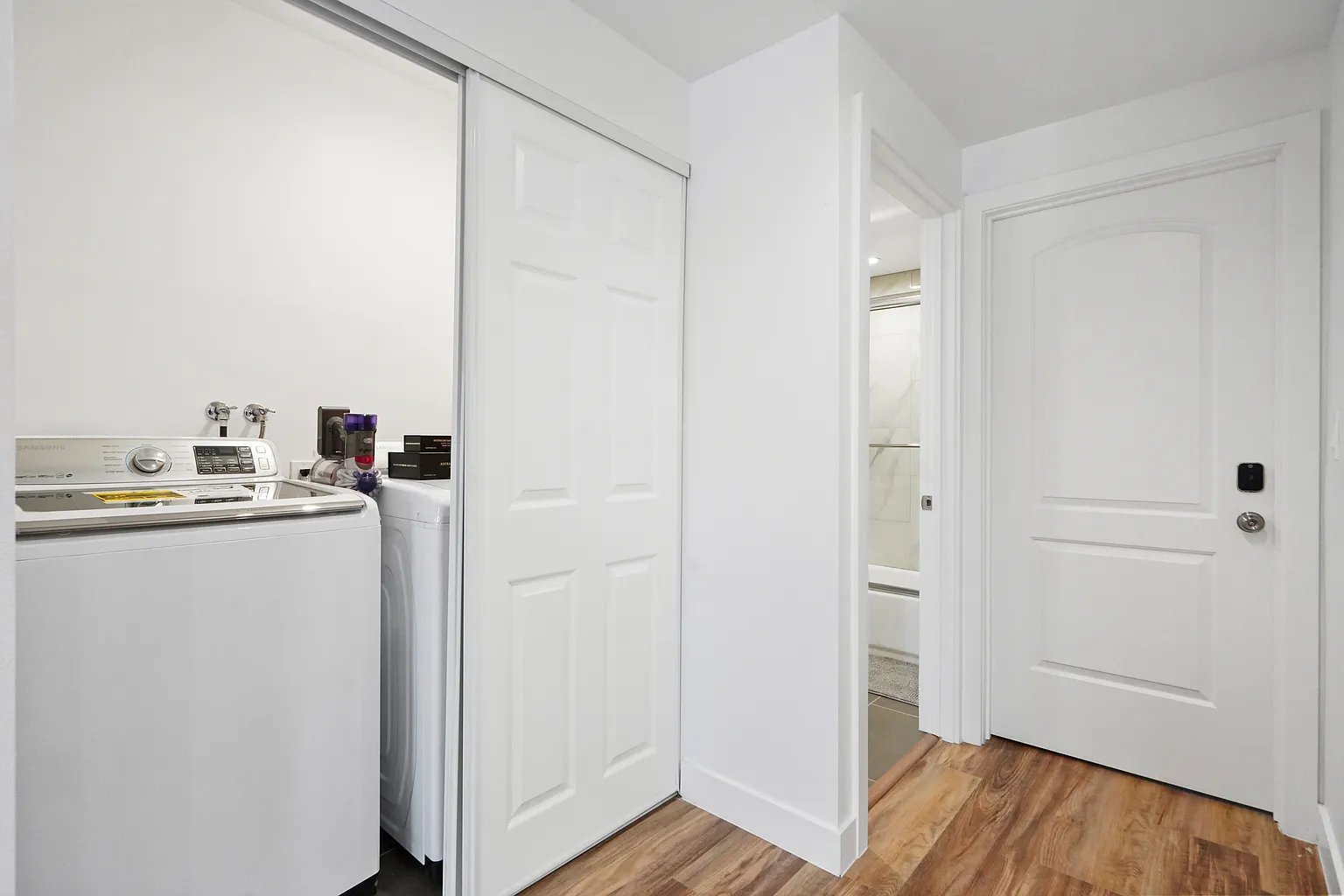 Culver City furnished apartment in-unit washer and dryer behind sliding door