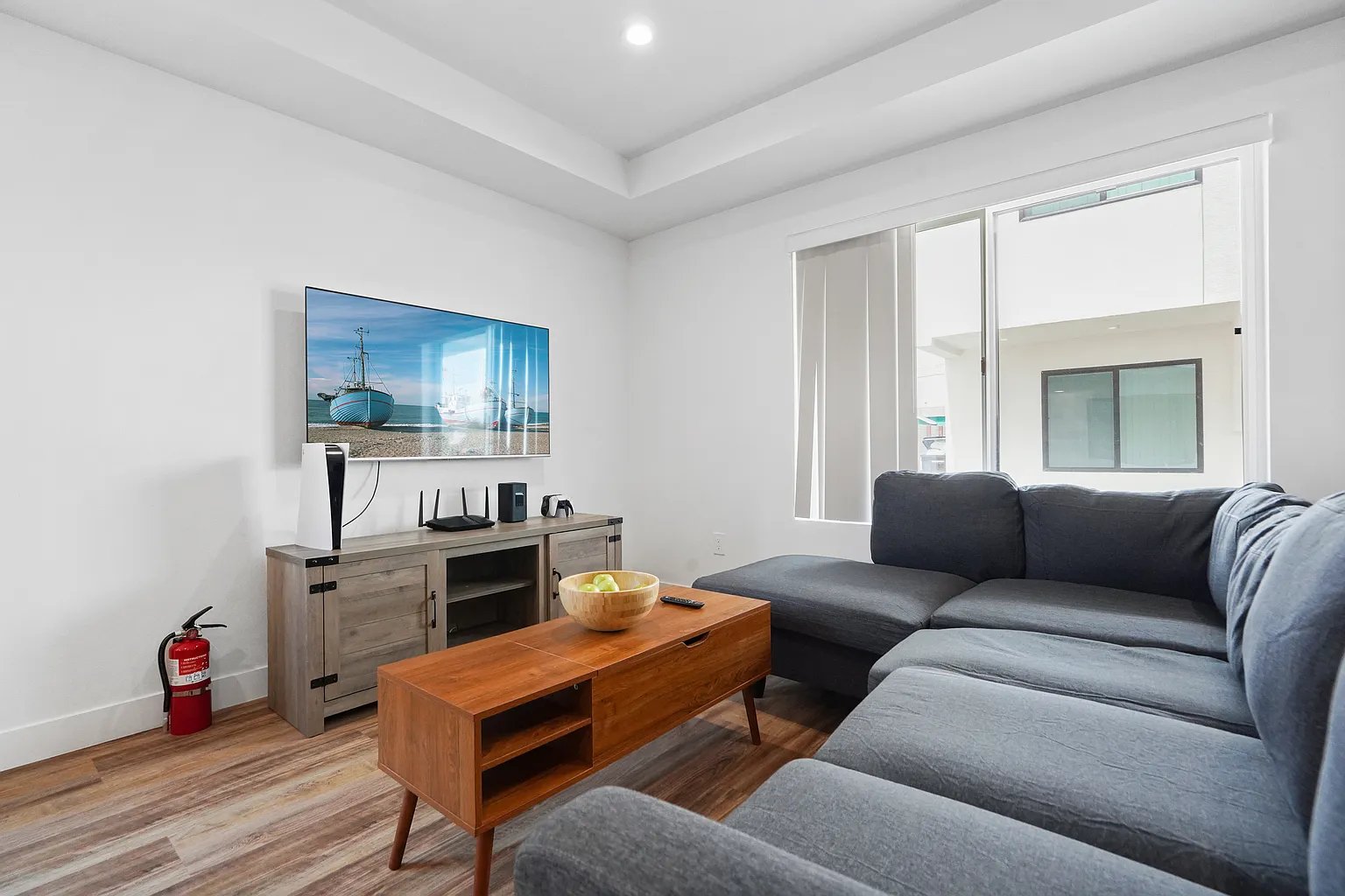 Culver City furnished apartment cozy living room with large smart TV and natural light