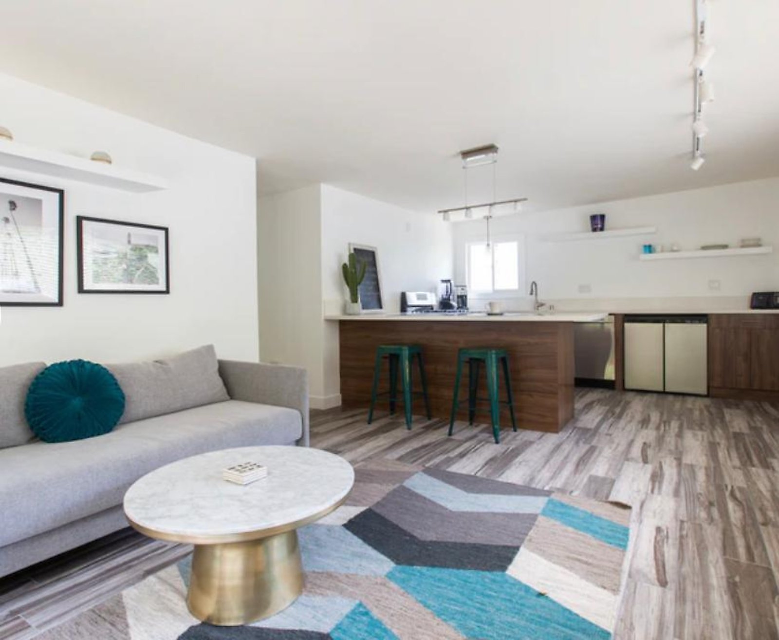 West Hollywood corporate housing modern open floor plan with kitchen bar seating