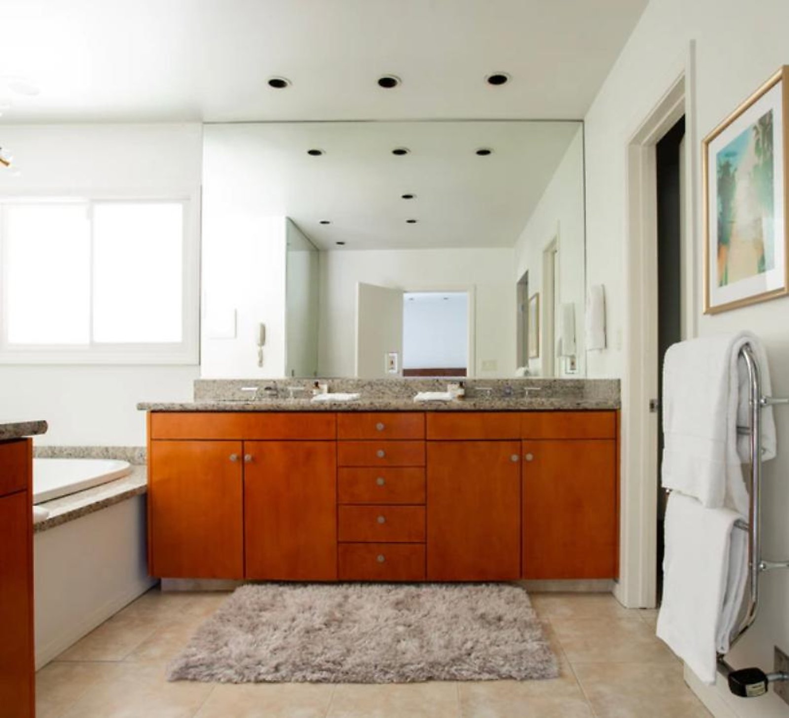 West Hollywood month-to-month apartment master bathroom with double vanity and soaking tub